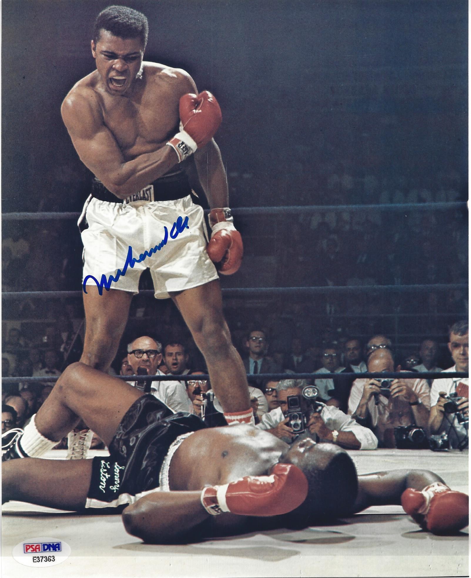 Signed 8x10 of Muhammad Ali after knocking down Sonny Liston in the ring Comes with Letter of Authenticity