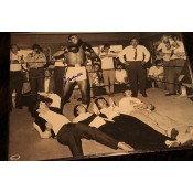  A 16x20 rare copy of Muhammad Ali with The Beattles signed by the Champ it includes a letter of Authenticity